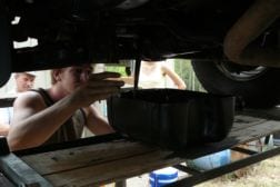Changing the dirty oil on a diesel engine 