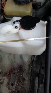 Clean engine oil on dipstick after using the Flushing Oil Concentrate