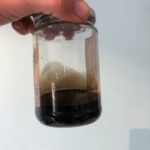100 ml of oil drained from a catch can